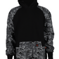 Men's black camo pullover hoodie made from 100% cotton fleece with kangaroo pocket and ribbed cuffs.